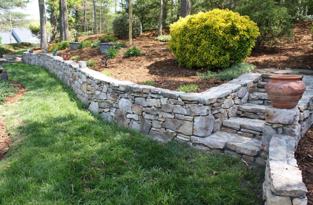 retaining wall soil erosion image for local lawn care company website london ontario
